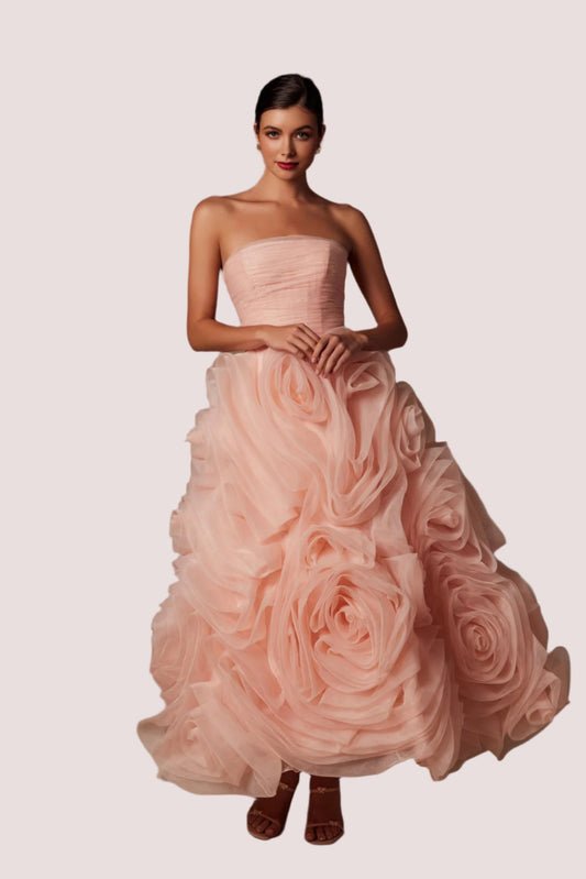 Discover the elegance of the Nox Anabel JQ1037 Tea Length A Line Ruffle Formal Dress. Featuring a strapless design and a flattering A-line silhouette, this dress is made from high-quality organza with delicate floral detailing. The corset closure creates a customizable fit, making it perfect for any formal event.