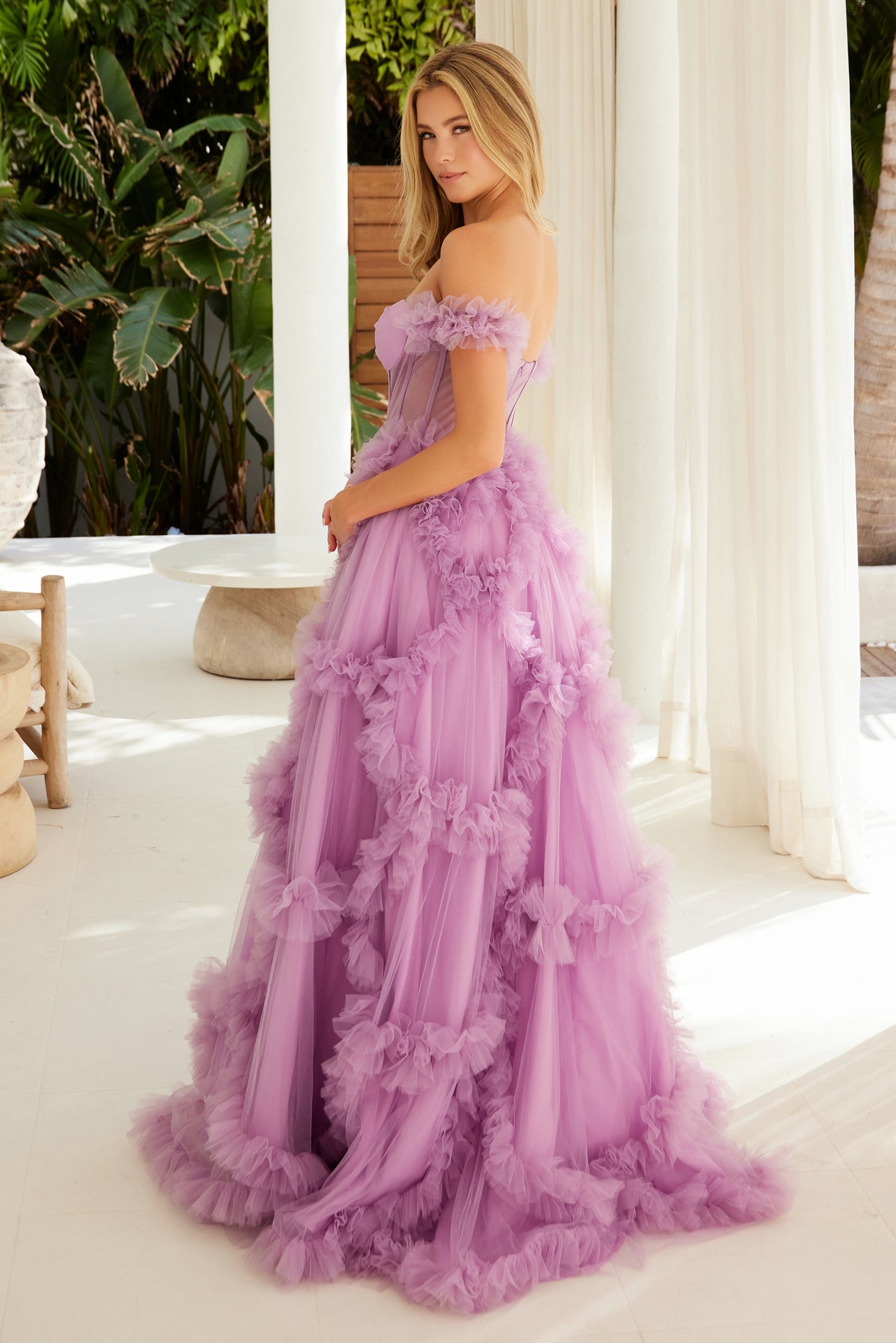 This Nox Anabel Y1472 prom dress features a unique combination of a sheer corset, tulle ballgown, and off-the-shoulder design. Expertly crafted with pleated ruffles, this dress is elegant and flattering, perfect for making a statement at any special occasion. Make a bold and sophisticated choice with this stunning dress.

Sizes: 0-16

Colors: Dusty Lavender, Fuchsia, Powder Blue, Red, Sage Green