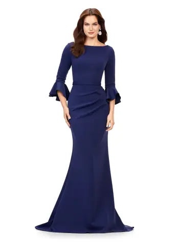 Ashley Lauren 11325 Crew Neck Three Quarter Flutter Sleeves Ruched Skirt Fitted Gown. This timeless and elegent evening gown features flutter three quarter sleeves. The skirt is adorned with ruching and finished with a sweep train.