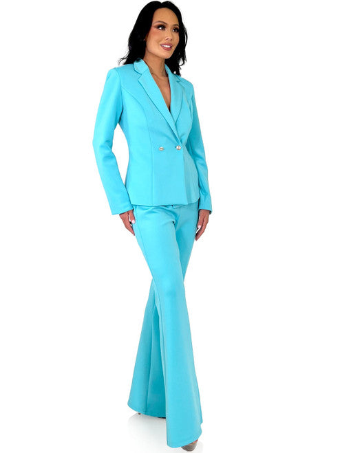 The Marc Defang 8124 Scuba Pageant Jumpsuit is a formal and professional pant suit with crystal blazer buttons. This jumpsuit is made of high-quality and durable Scuba fabric that ensures a comfortable fit for a wide range of body types. The Crystal blazer buttons add a unique touch of style to the look.  Sizes: 00-16  Colors: Baby Blue, White, Hot Pink, Neon Green, Royal, Seafoam, Black  *Ask for custom color - Allow 30 days Production