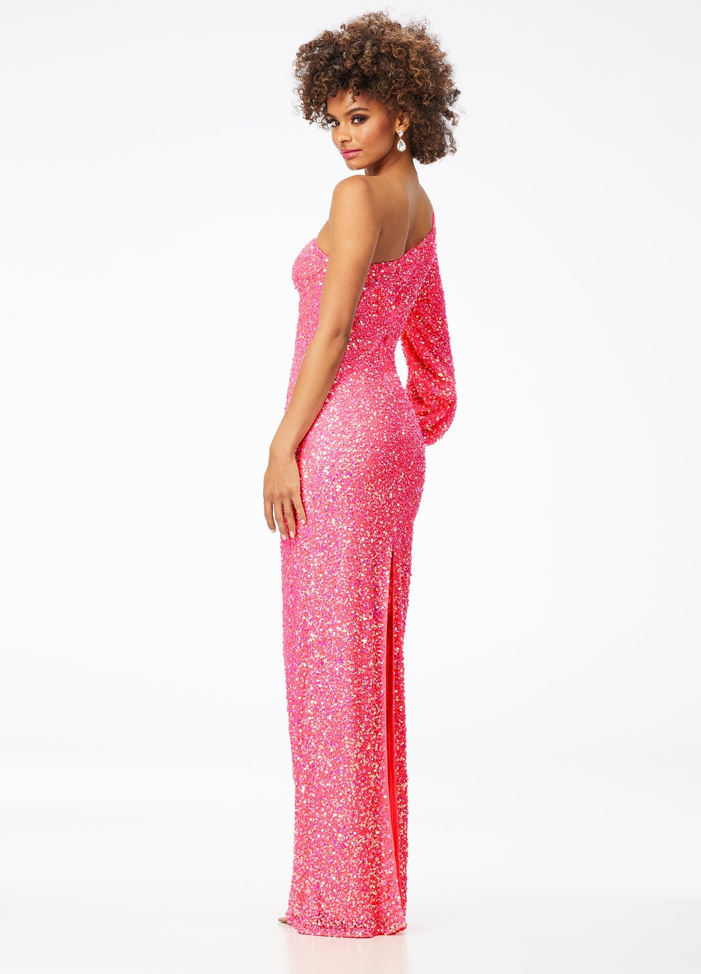 Ashley Lauren 11194  This gorgeous sequin gown features a one shoulder neckline dress features a bishop sleeve and a fitted column skirt with back vent.  Available colors:  Neon Pink, Peacock, Purple, Emerald, Black