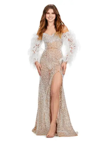 This Ashley Lauren 11359 Long Prom Dress is a fully beaded gown with feather sleeves, perfect for any formal occasion or pageant. The intricate beading and feather details add a touch of elegance and style, making you stand out in the crowd. Look and feel like a true queen in this stunning dress. We're living for this glam gown! This fitted, fully beaded dress features a sweetheart neckline with feather sleeves and a left leg slit.