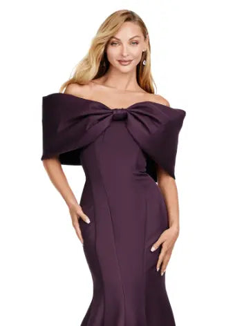 Experience elegance with the Ashley Lauren 11413 Long Prom Dress. Designed with an off-shoulder neckline, this dress is crafted from luxurious double-faced satin and features an oversized bow for added drama. Perfect for formal events and pageants, this dress will make you stand out with its sophisticated and flattering silhouette. Talk about elegant. This off shoulder gown is complete with an oversized bow along the neckline. This double faceted satin gown has a mermaid silhouette.