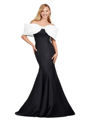 Experience elegance with the Ashley Lauren 11413 Long Prom Dress. Designed with an off-shoulder neckline, this dress is crafted from luxurious double-faced satin and features an oversized bow for added drama. Perfect for formal events and pageants, this dress will make you stand out with its sophisticated and flattering silhouette. Talk about elegant. This off shoulder gown is complete with an oversized bow along the neckline. This double faceted satin gown has a mermaid silhouette.