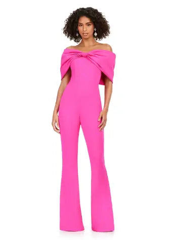 Make a statement at your next formal event with the Ashley Lauren 11414 Off Shoulder Scuba Jumpsuit. Its stylish off-shoulder design and oversized bow add a touch of elegance, while the scuba material provides a comfortable and flattering fit. Perfect for prom or any special occasion. Turn heads in this jumpsuit! This look is complete with an oversized bow off shoulder neckline.