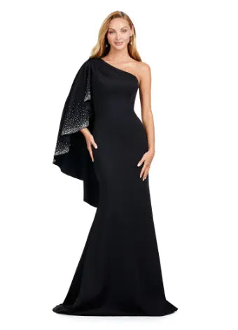 Elevate your formal ensemble with the Ashley Lauren 11421 Long Prom Dress. This fitted one shoulder gown features cascading ruffle sleeves, adding an elegant touch to your look. Perfect for pageants and prom, this dress is sure to make a statement. Expertly crafted for a flawless fit. This dress is all about classic elegance. The one shoulder design features a cascading ruffle sleeve with press on stone details.