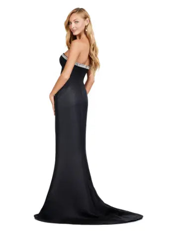 Combining elegance and modern style, the Ashley Lauren 11424 Long Prom Dress is perfect for any formal event. The fitted strapless design flatters your figure, while the oversized off-shoulder bow adds a touch of sophistication. With its stunning overlay and sleek silhouette, this dress will make you stand out in any pageant or evening occasion. Dazzle the crowd with this stunning strapless evening gown. The look is complete with a separate halter style overlay adding elegance to the look.