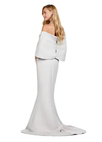 Combining elegance and modern style, the Ashley Lauren 11424 Long Prom Dress is perfect for any formal event. The fitted strapless design flatters your figure, while the oversized off-shoulder bow adds a touch of sophistication. With its stunning overlay and sleek silhouette, this dress will make you stand out in any pageant or evening occasion. Dazzle the crowd with this stunning strapless evening gown. The look is complete with a separate halter style overlay adding elegance to the look.