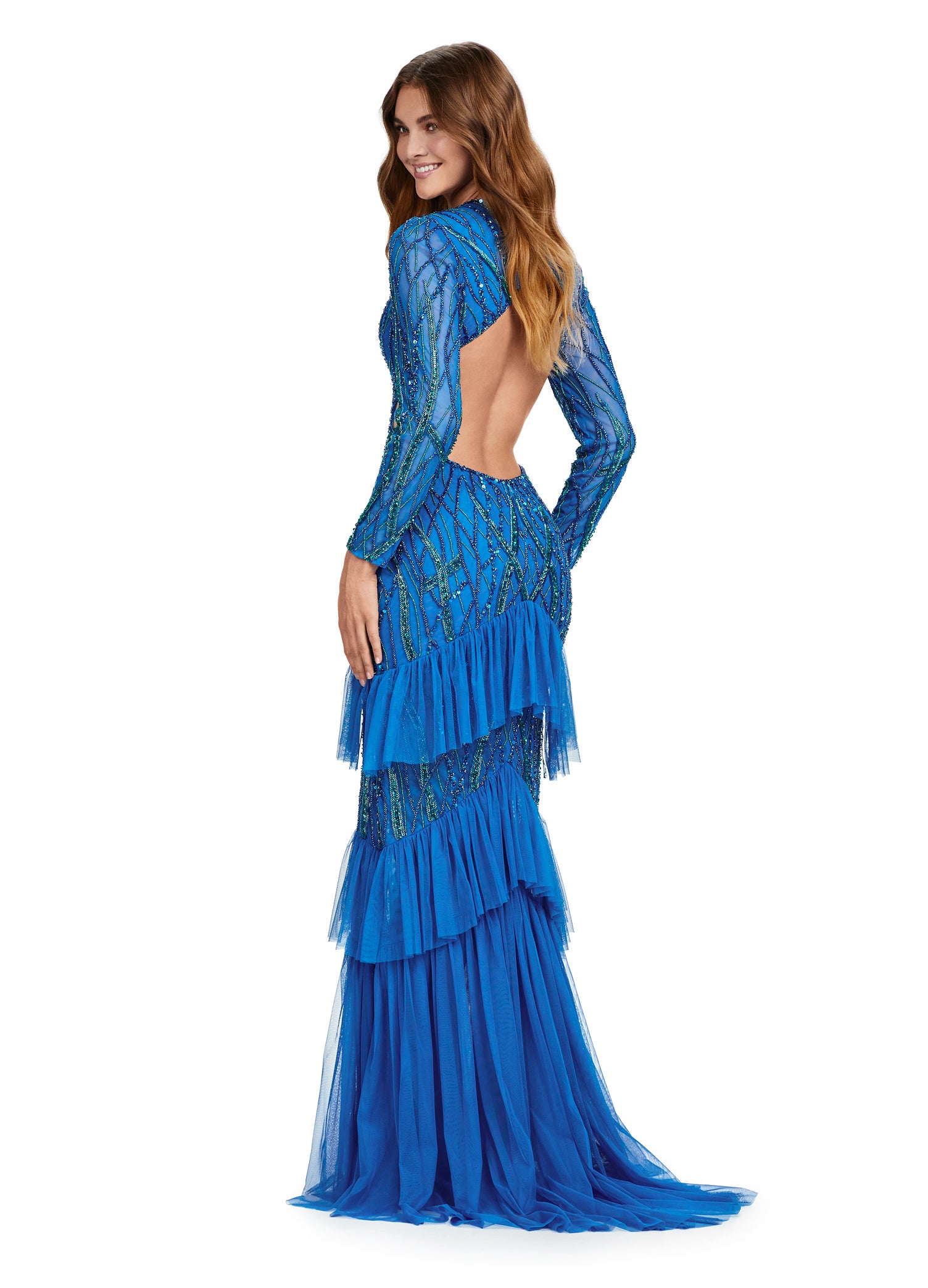 Step into elegance with the Ashley Lauren 11436 Long Prom Dress. This stunning gown features delicate beading, a flattering V-neckline, and a daring center slit with ruffled detailing. With its long sleeves, this dress is the perfect choice for a cool evening event. Make a statement in this formal gown. Fall in love with this gorgeous fully beaded long sleeve gown. Featuring an open back and center slit, this dress embodies effortless allure!