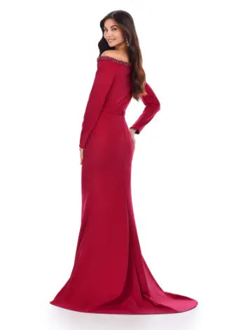 Feel like a queen in the Ashley Lauren 11450 Long Prom Dress. This stunning gown features a long sleeve scuba design, adorned with intricate beadwork and an asymmetrical neckline. Perfect for a formal event or pageant, this dress exudes elegance and sophistication. Can you say chic? This classic long sleeve scuba gown features an asymmetric beaded neckline that is perfect for your next event.