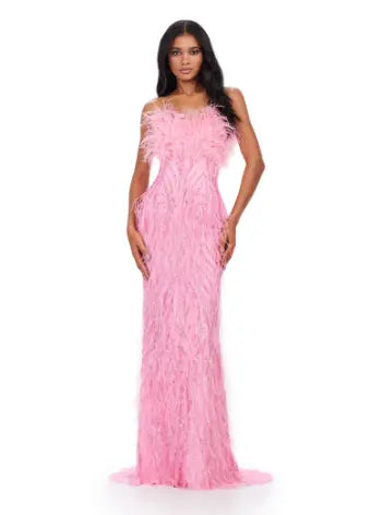 This Ashley Lauren long prom dress features a strapless, fully beaded bodice and a stunning feathered skirt, making it the perfect choice for any formal pageant. The intricate detailing and elegant design truly make this gown stand out and ensure you'll make a statement at any event. We're here for this look! This fully beaded strapless gown features an intricate beaded design and feathers throughout to help you stand out at your next event.