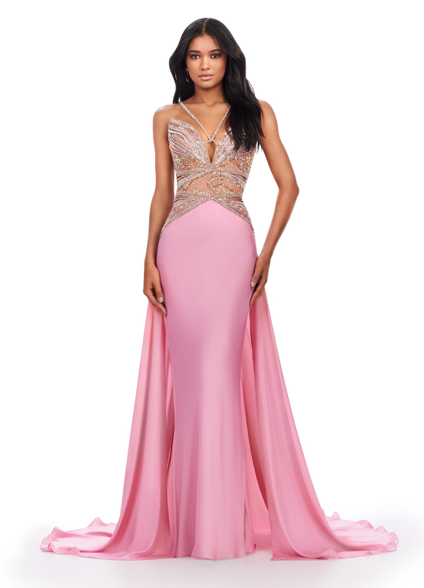 Be a showstopper in this stunning Ashley Lauren 11455 Long Prom Dress. The halter charmeuse gown features a fully beaded top and a V-neck, creating a glamorous look. With a flowing train and elegant silhouette, this dress is perfect for formal events and pageants. Elevate your style with this one-of-a-kind gown. Feel like a goddess in this charmeuse gown with a fully beaded bodice. The dress features a dramatic overskirt and a detailed bodice to make this look absolutely fabulous.