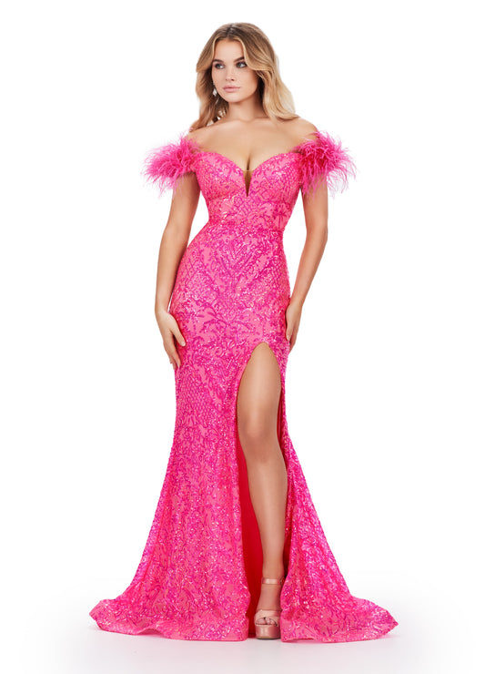 Elevate your prom look with the stunning Ashley Lauren 11463 Long Sequin Mermaid Prom Dress. The off the shoulder design and feather embellishments add a touch of glamour, while the slit detail adds a touch of flirtiness. This dress is perfect for making a statement on your special night. Stand out in this off the shoulder stretch sequin gown. We are living for this sweetheart neckline and feather details.