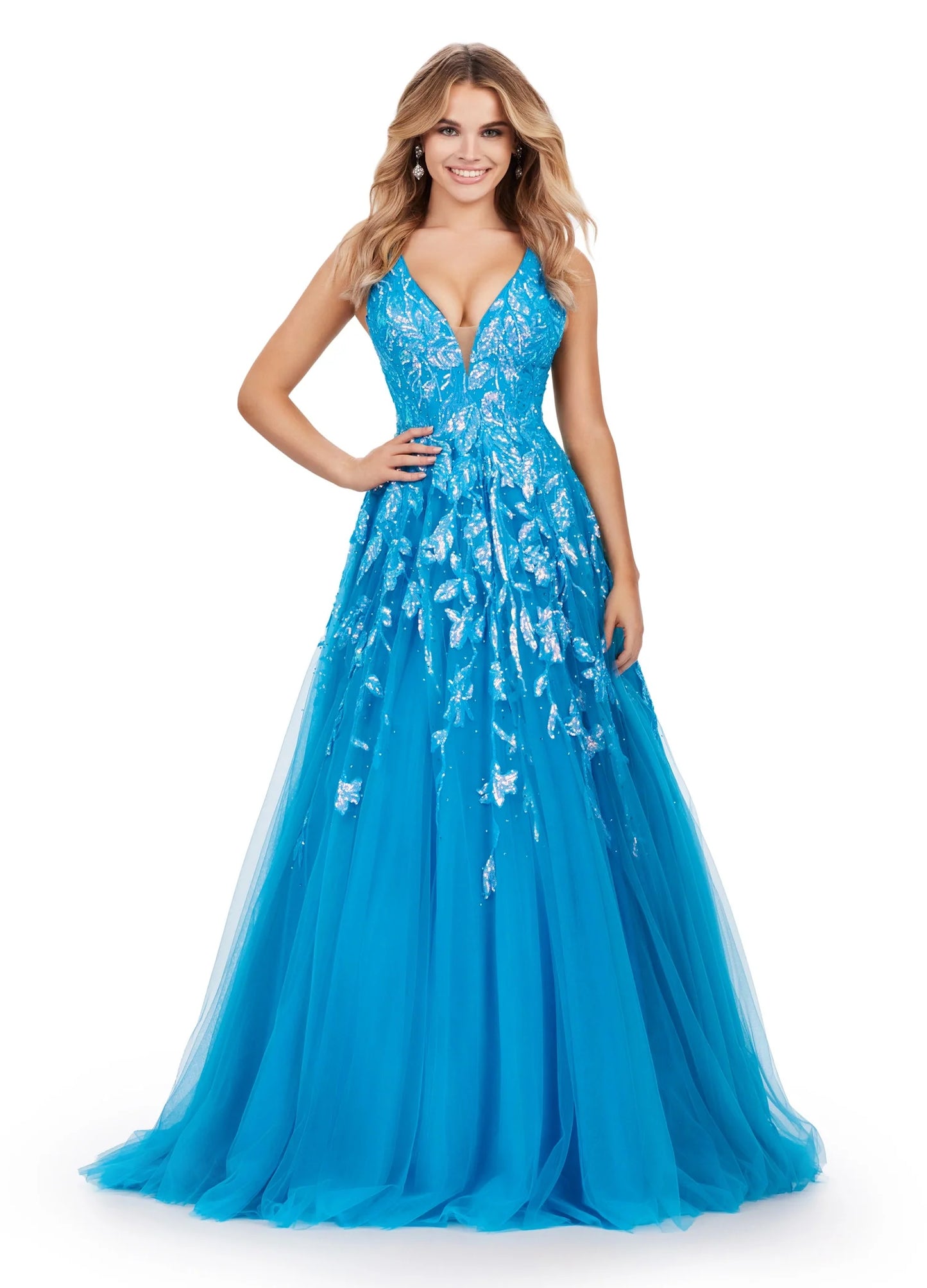 This Ashley Lauren 11470 Prom Dress will make a statement at any occasion. Made with sequin fabric and a pleated tulle skirt, the A-line silhouette will flatter any body shape, while the V-neckline adds a touch of sophistication. This glamorous gown is the perfect choice for making a lasting impression. 