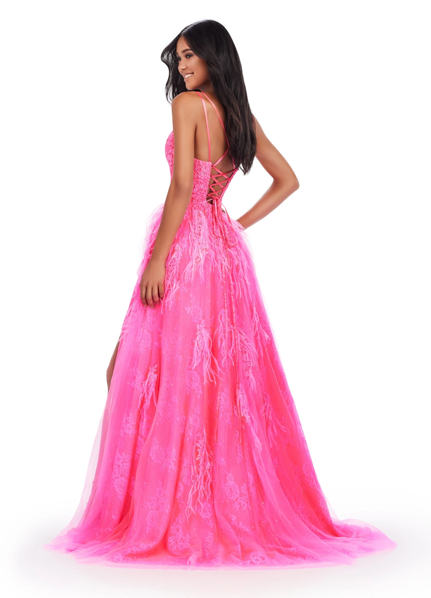 This Ashley Lauren 11480 dress is a stunningly unique piece for your next special event. Featuring intricate lace and feather detailing, a slim a-line fit with a thigh-high slit, a corset bodice, and an elegant low-back, this dress will be sure to draw attention. Perfect for prom, pageants, or any formal occasion. 