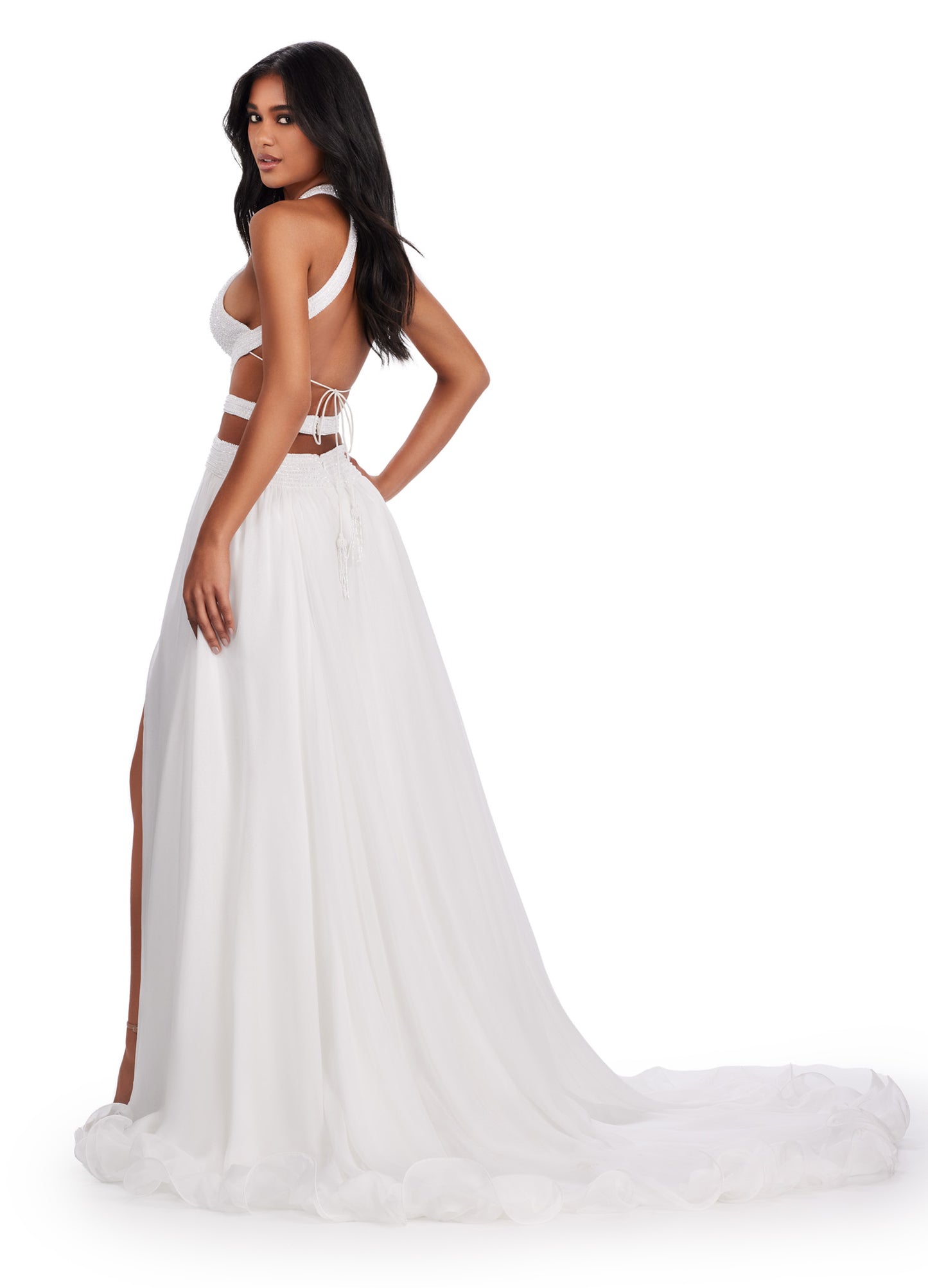 Elevate your formal attire with the Ashley Lauren 11504 Long Prom Dress. The cut out gown boasts a beaded bustier and chiffon skirt, creating a stunning silhouette that will turn heads. Perfect for prom, pageants, or any special occasion. Make a statement in this elegant and fashionable dress. Feel like royalty in this fabulous chiffon gown. The fully beaded bustier features intricate cut outs and an open back that'll be sure to set you apart from the crowd.