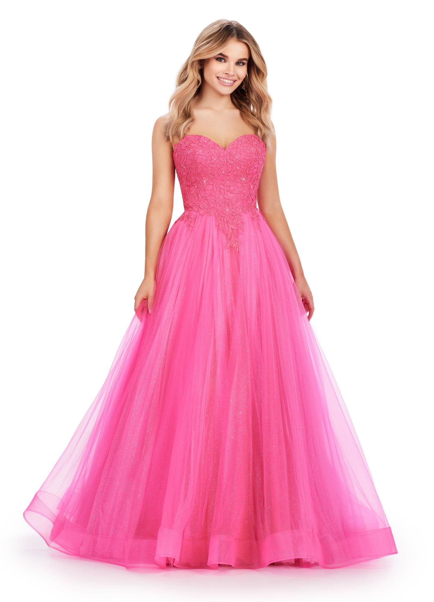 The Ashley Lauren 11518 is a stunning long prom dress that features a corset design and glitter tulle ball gown. The sweetheart neckline and formal pageant gown style make this dress perfect for any special occasion. Feel elegant and glamorous in this expertly crafted dress. The most romantic dress! This A-Line glitter tulle ball gown features a lace applique corset that laces up in the back.