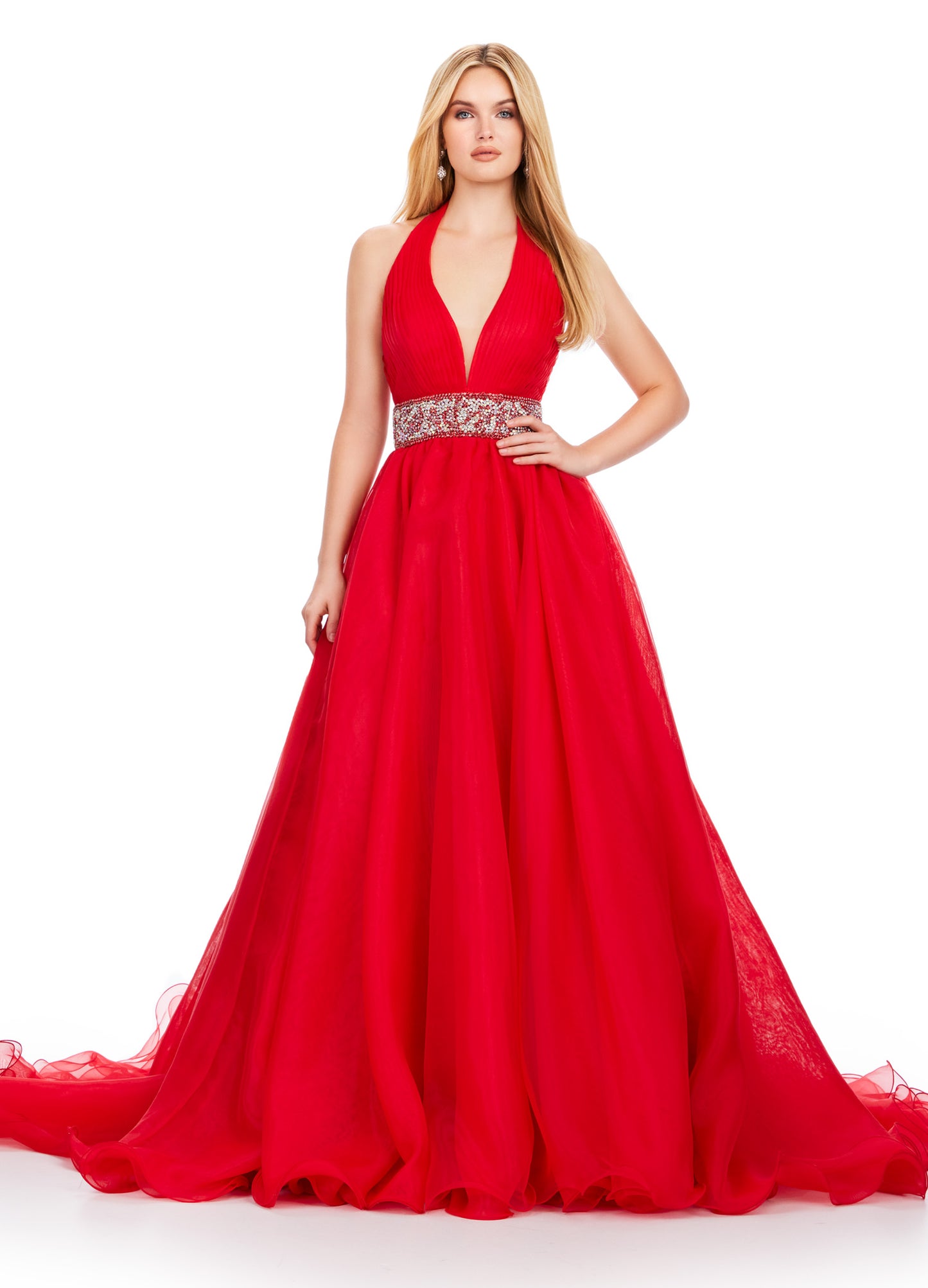 Expertly designed by Ashley Lauren, this formal pageant gown features a beautiful organza ball gown and a stunning beaded belt. Its delicate fabric and intricate details exude elegance, making it the perfect choice for any special occasion. Stand out and feel confident in this long prom dress. Turn heads in this v-neckline organza ball gown with wide fully encrusted crystal waistline. The look is complete with wire hem details.