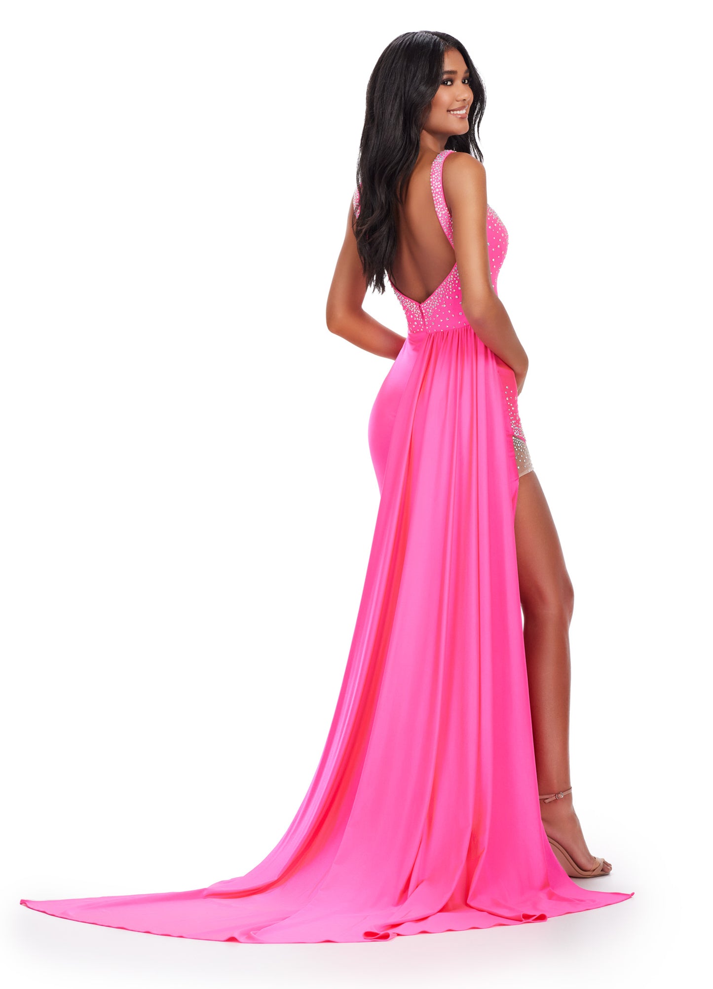 Elevate your formal look with the Ashley Lauren 11579 Long Prom Dress. Made with jersey fabric, this gown features press-on stones and a side skirt slit for added glamour. Perfect for pageants or prom, this dress will make you stand out on any occasion.This unique jersey gown features press on stones and a fabulous side skirt. Perfect for your next event!