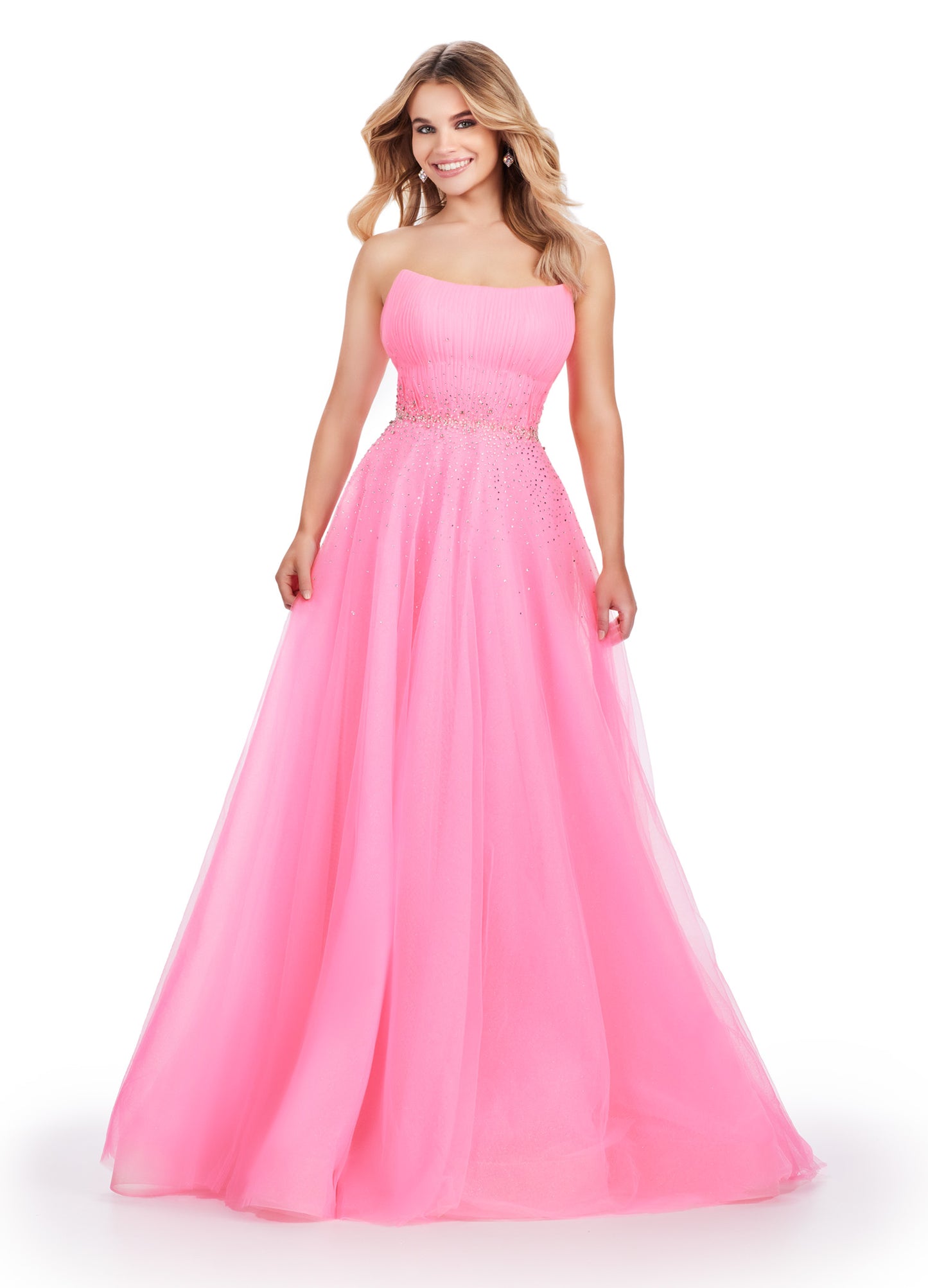 Expertly crafted by Ashley Lauren, this 11597 Long Prom Dress exudes timeless elegance. The strapless design coupled with glittery tulle creates a stunning ball gown silhouette. Adorned with a beautiful beaded belt, this formal pageant gown is a perfect choice for any special occasion. The perfect dress fit for a princess. This strapless glitter tulle ball gown features a beaded waist detail that'll be sure to make you sparkle at your next event!