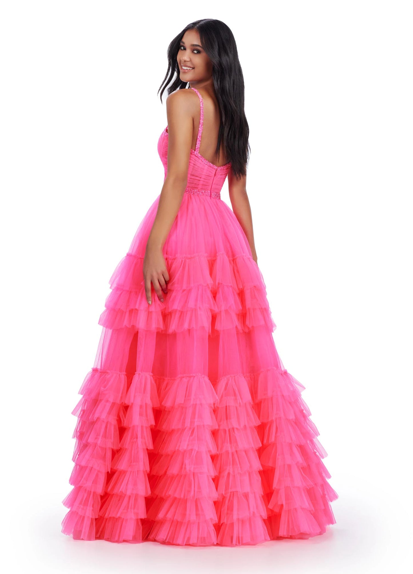 The Ashley Lauren11603 Long Tulle Ruffle Layer Ballgown Prom Dress is the perfect choice for your special occasion. With a beaded corset and ruffled layers for movement, this gown adds the perfect amount of glamour and elegance.