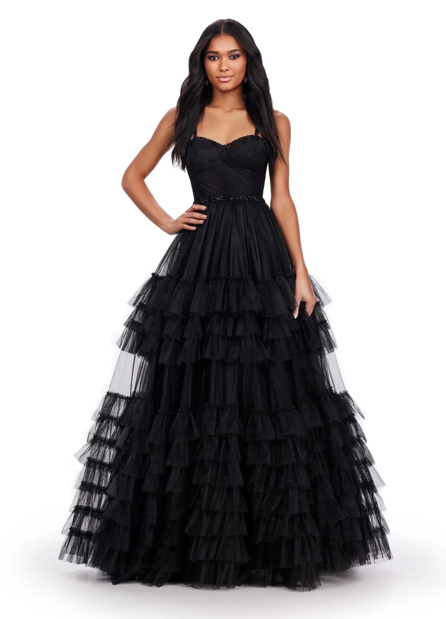 The Ashley Lauren11603 Long Tulle Ruffle Layer Ballgown Prom Dress is the perfect choice for your special occasion. With a beaded corset and ruffled layers for movement, this gown adds the perfect amount of glamour and elegance.