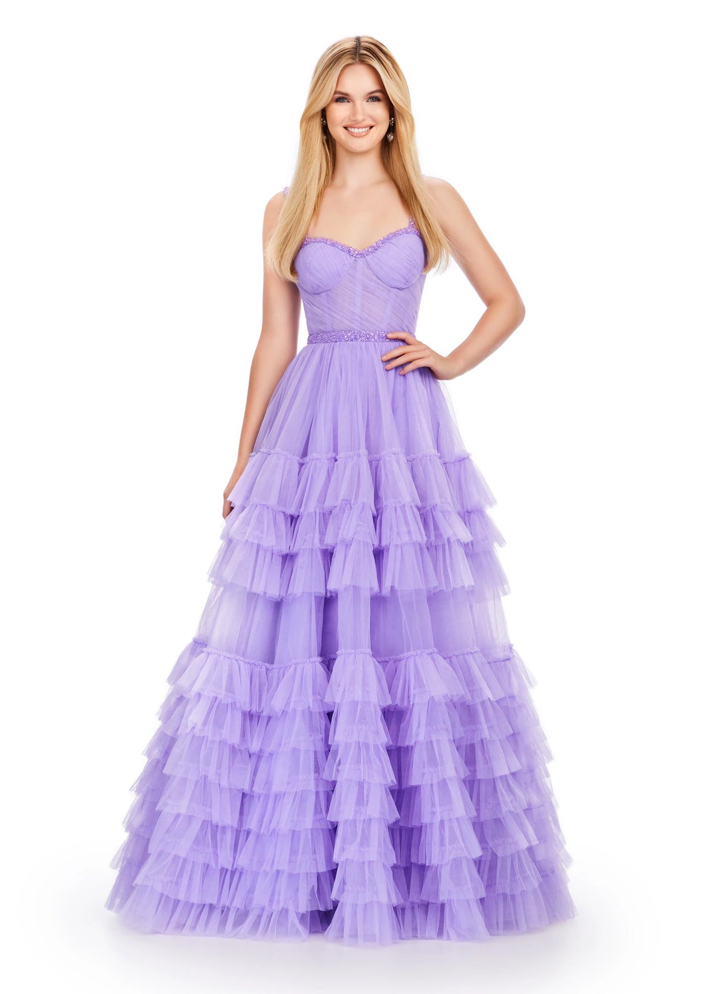 The Ashley Lauren11603 Long Tulle Ruffle Layer Ballgown Prom Dress is the perfect choice for your special occasion. With a beaded corset and ruffled layers for movement, this gown adds the perfect amount of glamour and elegance.