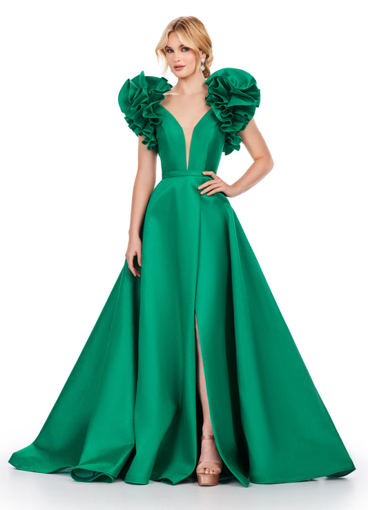 This Ashley Lauren 11610 Long Prom Dress boasts a V-neck and flattering ball gown silhouette in luxurious mikado fabric. The oversized ruffles add a touch of drama to this formal piece, perfect for pageants and other special occasions. Sleek and eye-catching, this dress is sure to make you stand out in any crowd. We're here for the drama! This A-line Mikado gown features a V-neckline and dramatic ruffle sleeves with a slit.