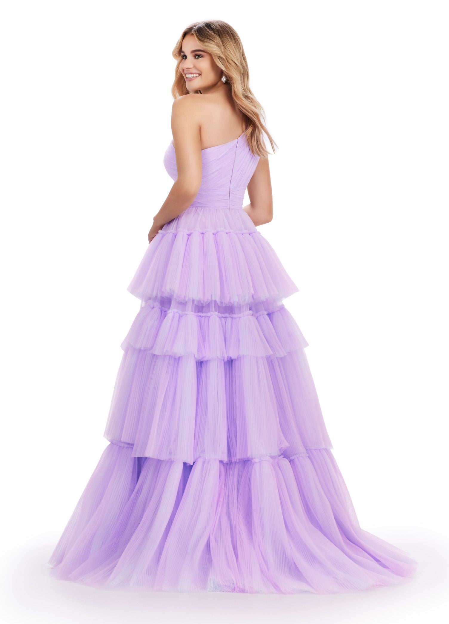 Turn heads at prom or pageants with the Ashley Lauren 11619 Long Prom Dress. This stunning two-tone tiered tulle ball gown features a sleek left leg slit, adding a touch of elegance to your look. Expertly crafted with top-quality materials, this dress is perfect for making a statement and feeling confident. Tiered dreams! This two-tone tired tulle ball gown features a one shoulder design and a left leg slit.