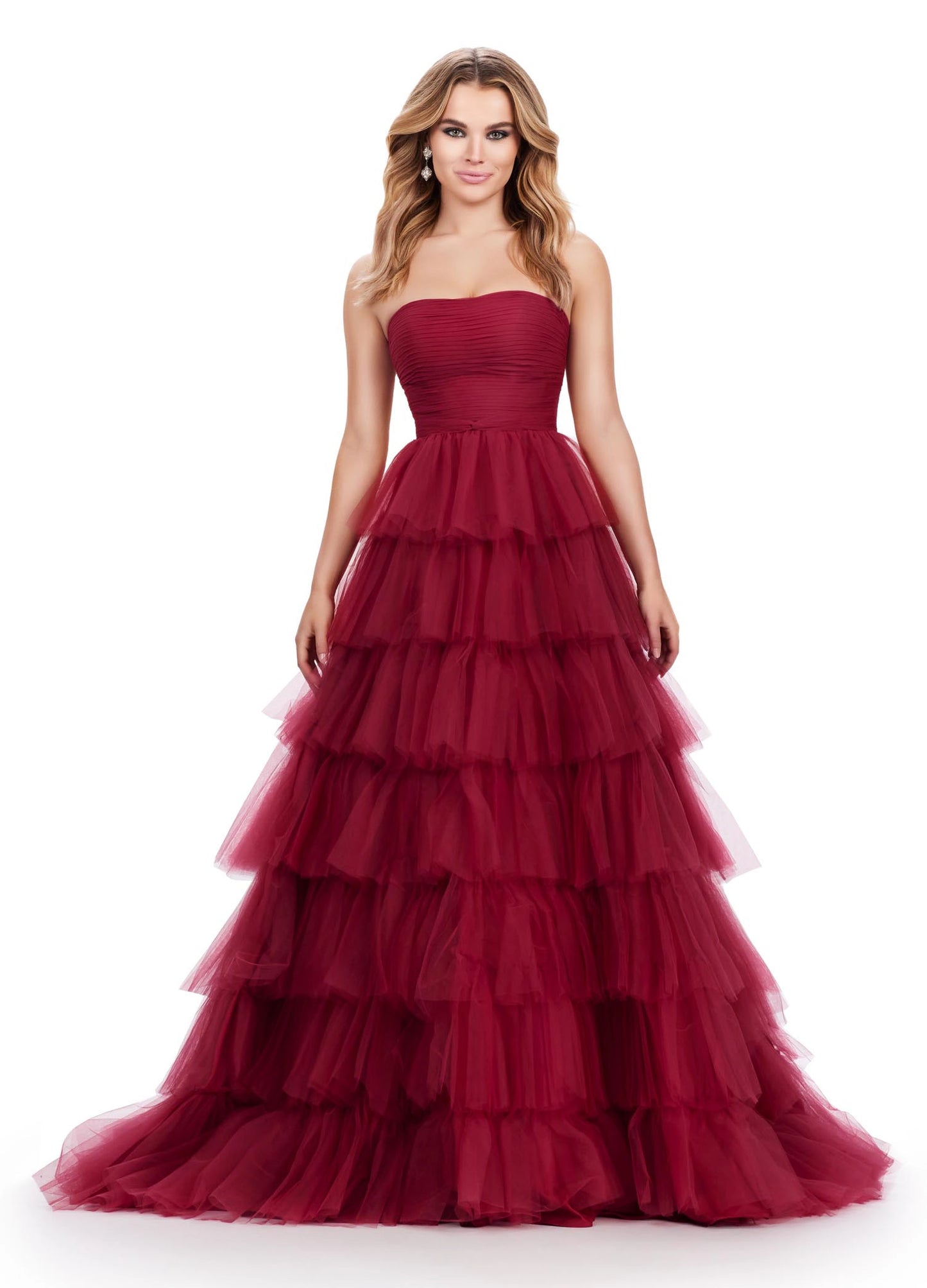 Achieve a timeless classic look with Ashley Lauren 11621. This long layer tulle strapless ballgown has tiered detailing and a fitted sweetheart bodice for a flattering fit. Crafted from luxurious fabrics, this formal gown is perfect for any special occasion. 