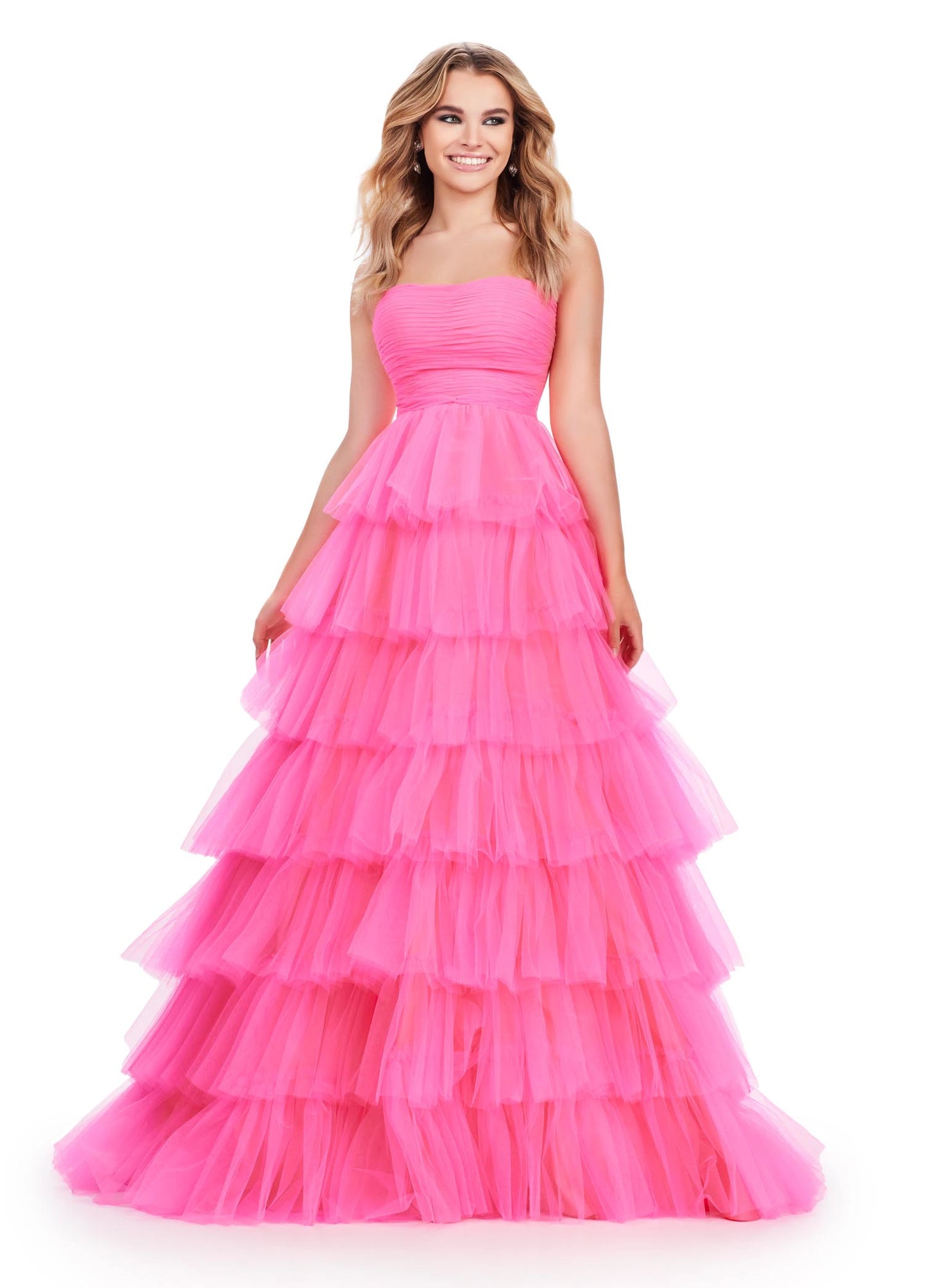 Achieve a timeless classic look with Ashley Lauren 11621. This long layer tulle strapless ballgown has tiered detailing and a fitted sweetheart bodice for a flattering fit. Crafted from luxurious fabrics, this formal gown is perfect for any special occasion. 