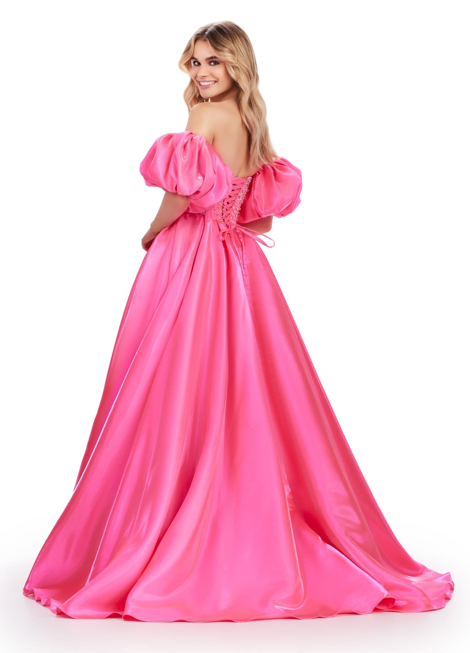 Elevate your formalwear with the Ashley Lauren 11642 prom dress. The luxurious satin fabric, sweetheart neckline, and crystal corset add elegance and charm to this A-line ballgown. The puff sleeves bring a touch of drama and playfulness to your look. Perfect for prom or pageants. A satin ball gown fit for a queen. This strapless dress features a beaded corset bodice with detachable puff sleeves and a lace up back.