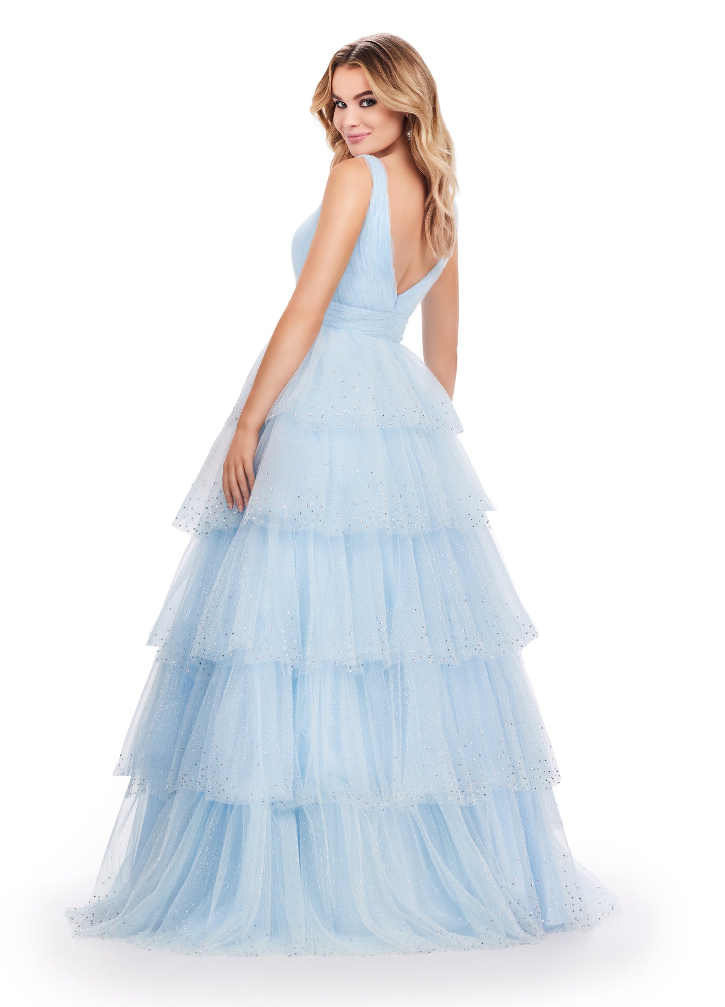 Ashley Lauren 11672 Long Layered Tulle Crystal Ball Gown Prom Dress Formal Pageant You are sure to stand out in this glitter tulle v-neckline ball gown! The glitter tulle is sure to sparkle with the added heat-set stones throughout the multi-tiered skirt.  COLORS: Lilac, Sky, Black, Hot Pink Sizes: 00-24 V-Neckline V-Back A-Line Tiered Ruffle Skirt