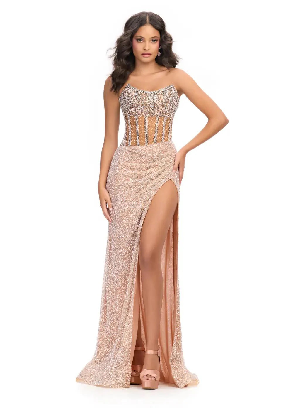 The Ashley Lauren 11830 Prom Dress is a stunning choice for any formal occasion. Adorned with sequins and sheer crystal detailing, this strapless corset gown exudes elegance and luxury. The slit adds a touch of allure while the corset provides a flawless fit. Perfect for making a statement on any red carpet event or pageant stage