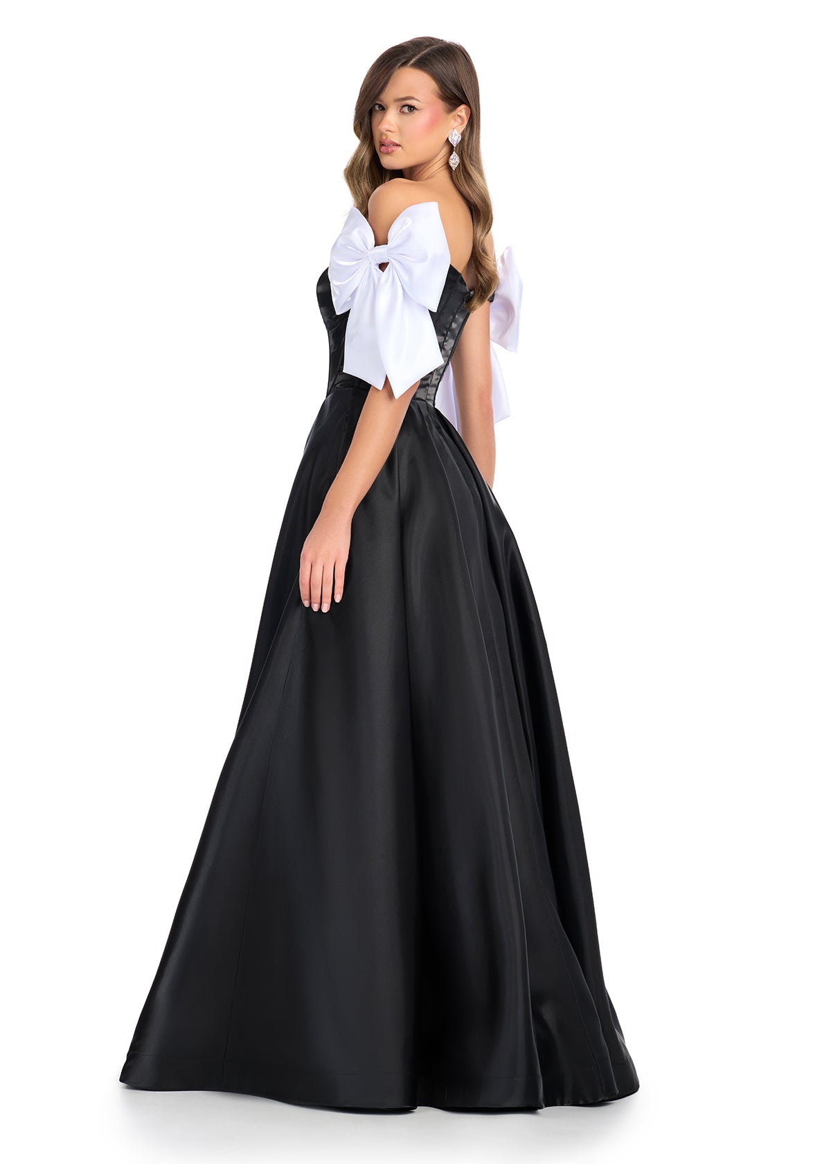 Elevate your pageant style with the Ashley Lauren 11871 long dress. This stunning gown features an off-the-shoulder neckline, a flattering corset bodice, and a chic A-line silhouette with pockets. The elegant long bow adds a touch of sophistication. Perfect for making a statement on stage.

Sizes: 00-18