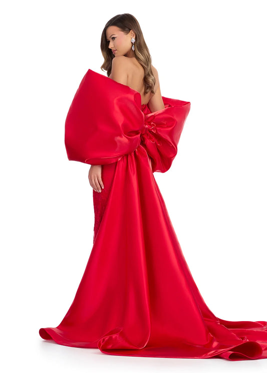 Add a touch of glamour to your formal attire with the Ashley Lauren 12007 Oversize Bow Cape. Made of luxurious satin shimmer fabric, this off the shoulder accessory features an oversized bow that will make a statement. Perfect for special occasions, stand out with this elegant cape.&nbsp;The bigger the bow, the better! This cape is the perfect accessory to add to your wardrobe. Whether you're looking to make a statement at prom or wow the judges on stage, this accessory is a must have!