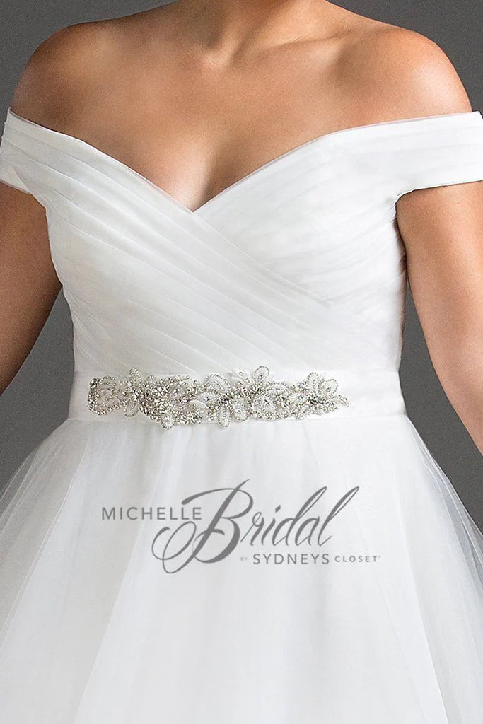 Michelle Bride For Sydney's Closet MB1812 A-Line V-Neck Lace Up Back Off The Shoulder Straps Pleated Plus Size Bridal Gown. Look radiant in the Michelle Bride For Sydney's Closet MB1812 A-Line V-Neck Gown. Crafted from quality fabric, this design features off the shoulder straps, a pleated bodice, and a lace-up back for an adjustable fit. Perfect for the plus-size bride!