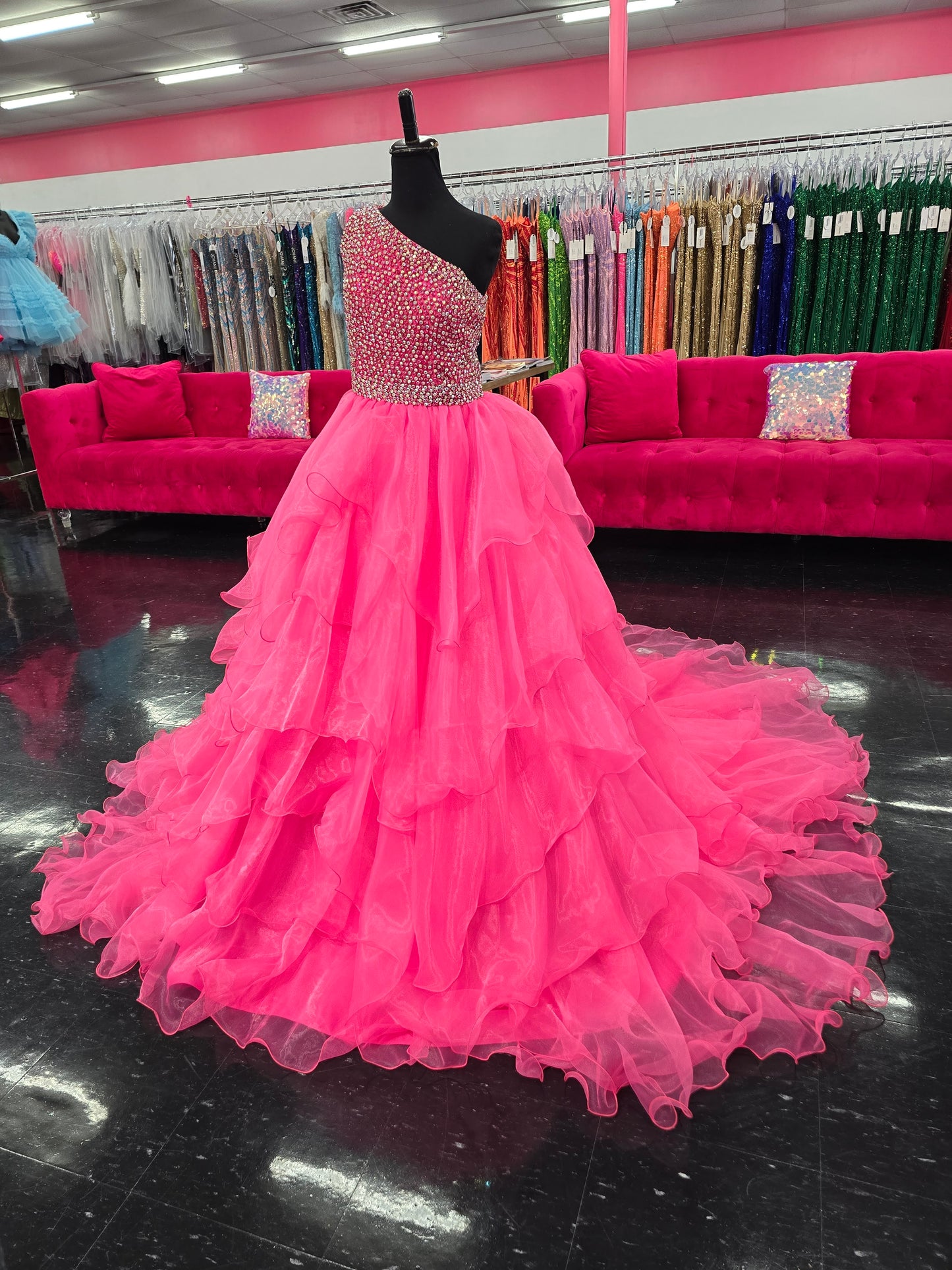 Introducing the Samantha Blake 1025 Girls Long Pageant Dress. Made with Chiffon Ruffle layers and a one shoulder design, this gown exudes elegance and sophistication. Perfect for formal events and pageants, your little girl will shine and feel like a princess in this stunning dress.&nbsp;