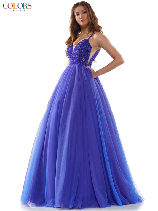 Make a statement in Colors 2382 Long Tulle Ballgown. Featuring a crystal V-neck, open corset back and formal ballgown skirt, this glamorous gown is the perfect choice for prom or any special night. 47" tulle gown with beaded bodice, sheer side panels, plunged V neck and lace up back detail  Sizes: 0-20   Colors: Black, Red, Emerald, Off White, Royal Purple