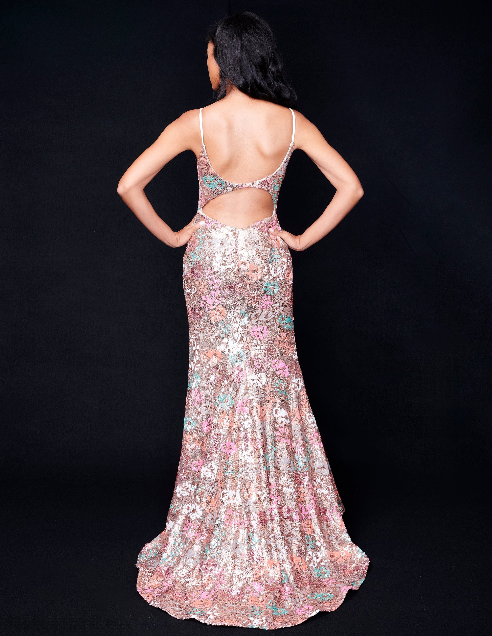 <p data-mce-fragment="1">Be the star of the evening in the Nina Canacci 2393 Sequin Floral Prom Dress. This stunning gown features a beautiful floral sequin design, a flattering backless style, and a fitted V neck silhouette. Perfect for formal events or as a guest, this dress will have all eyes on you.</p> <p data-mce-fragment="1">Sizes: 0-12</p> <p data-mce-fragment="1">Colors: Gold/Multi</p>