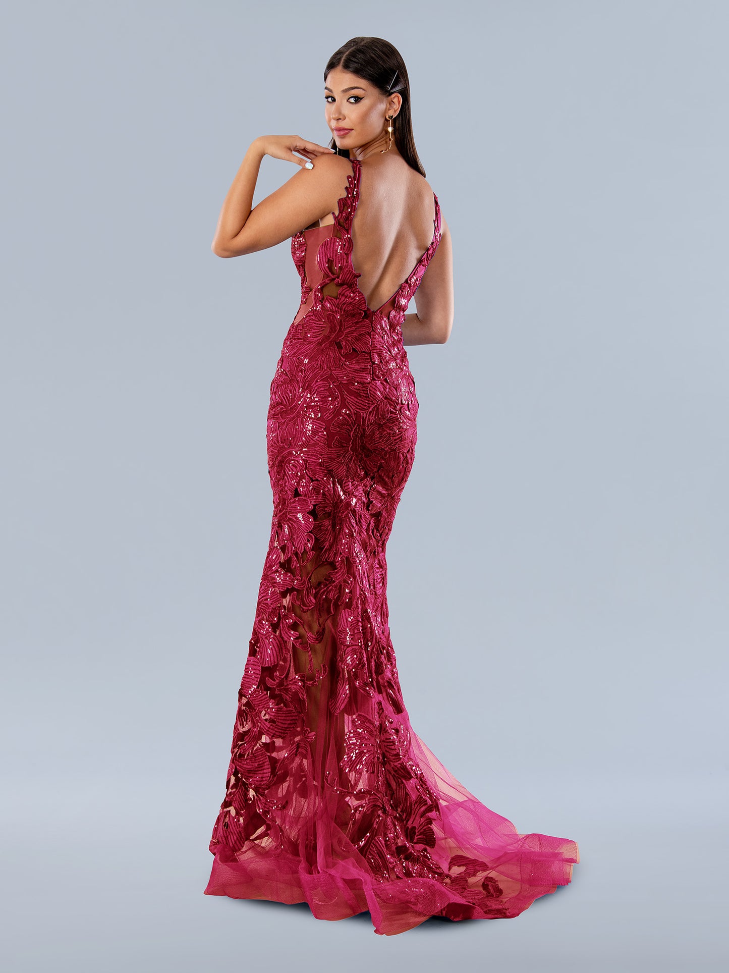 This Stella Couture 24244 Long Prom Dress is sure to make an unforgettable statement. Crafted from sheer sequin lace, this V-neck style features a figure-hugging fit and long train, perfect for formal occasions such as pageants and prom.  Sizes: 0-16  Colors: Black, Red, Royal