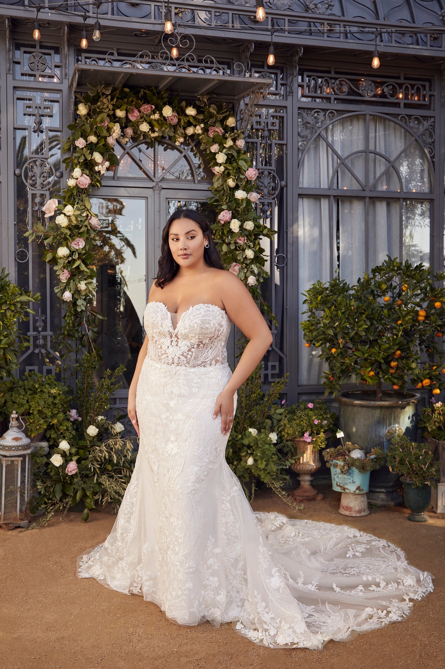 Indulge in luxury and grace with the Casablanca 2477 beaded mermaid wedding dress. The stunning long sleeve, strapless design is embellished with intricate beading, adding a touch of glamour to your special day. The fitted silhouette and elegant train will enhance your natural curves and leave you feeling like a true goddess. Artful and intricate, Style 2477 Delaney by Casablanca Bridal embodies storybook romance. Delicate lace, sequins, and beading sculpt the sweetheart neckline of this strapless fit and f