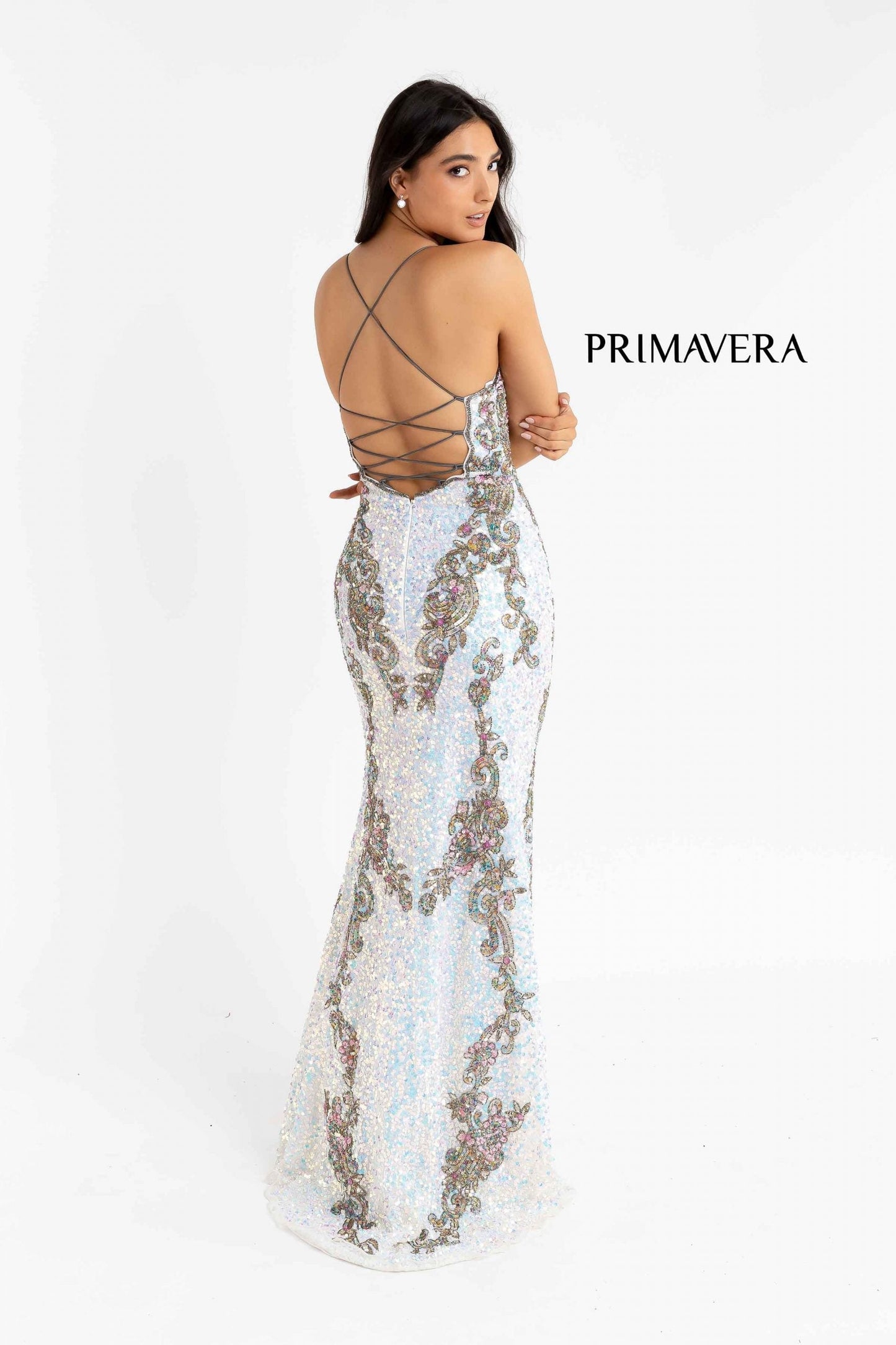 Primavera Couture 3211 is a Long fitted sequin Embellished Formal Evening Gown. This Prom Dress Features a deep V Neck with an open Corset lace up back. Beaded & embellished elegant scroll pattern accentuate curves. Fully beaded prom dress with floral pattern and side slit. Long Sequin Gown featuring a v neckline. slit in the fitted skirt, Slit in Thigh. Stunning Pageant Dress, Prom Gown & More!