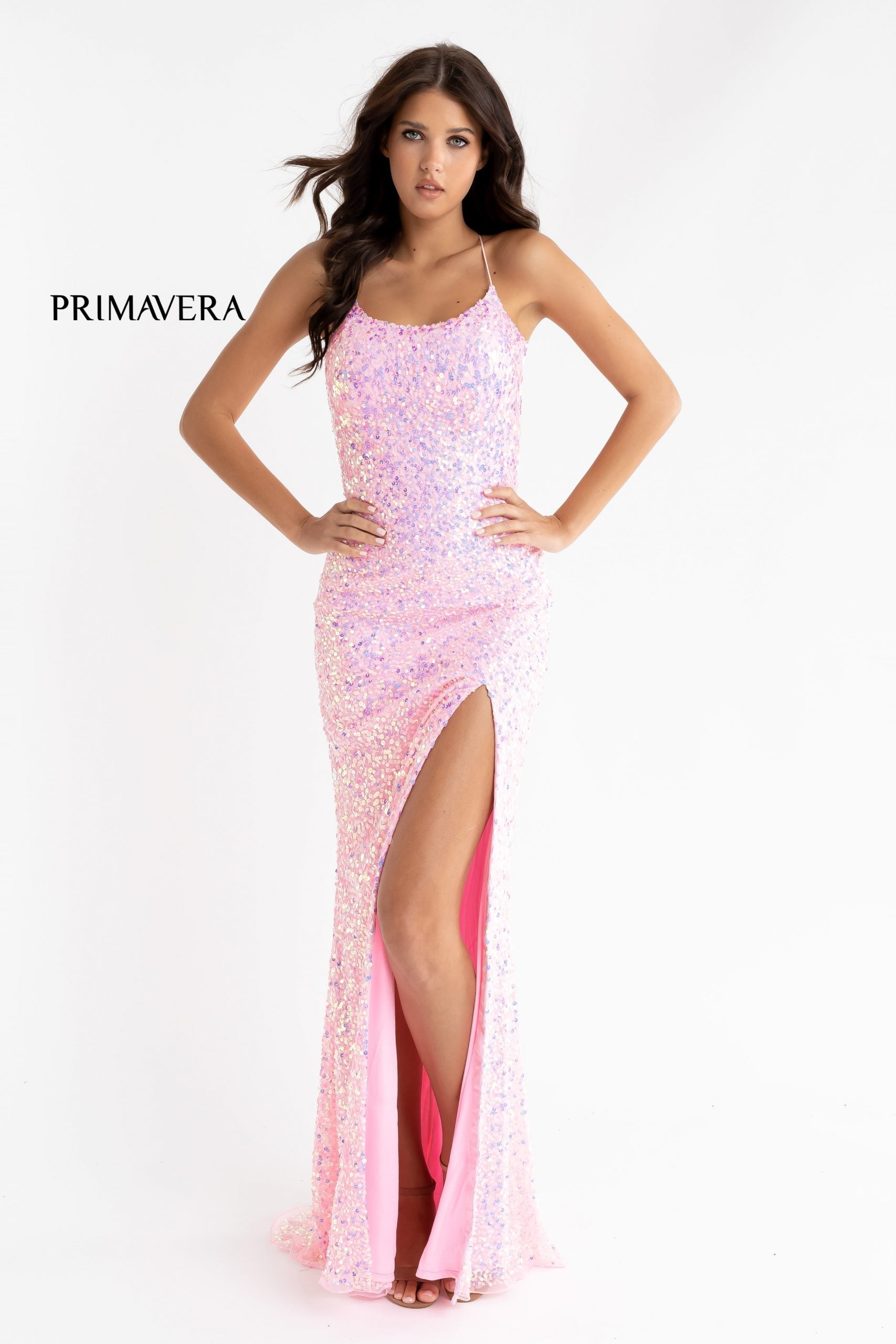 Primavera Couture 3290 This prom dress adds a pop to the multi sequins dress.  With a scoop neckline and spaghetti straps that cross and tie in the back.  This long evening dress has a side slit.  Available sizes:  000, 00, 0, 2, 4, 6, 8, 10, 12, 14, 16