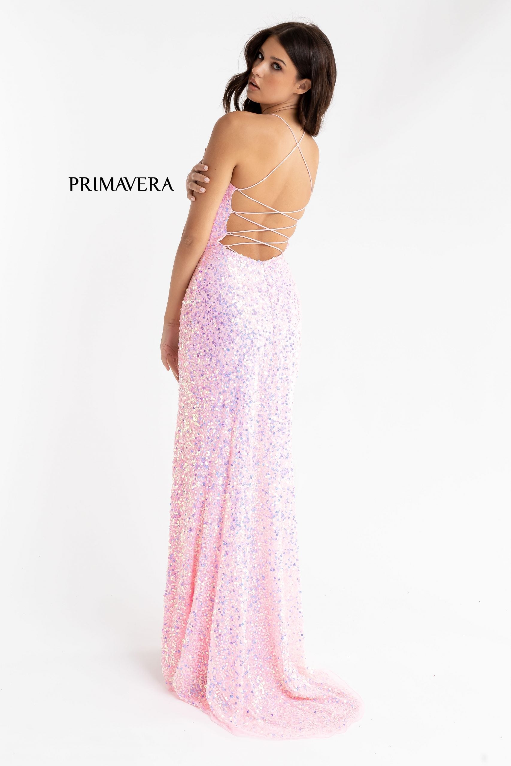 Primavera Couture 3290 This prom dress adds a pop to the multi sequins dress.  With a scoop neckline and spaghetti straps that cross and tie in the back.  This long evening dress has a side slit.  Available sizes:  000, 00, 0, 2, 4, 6, 8, 10, 12, 14, 16