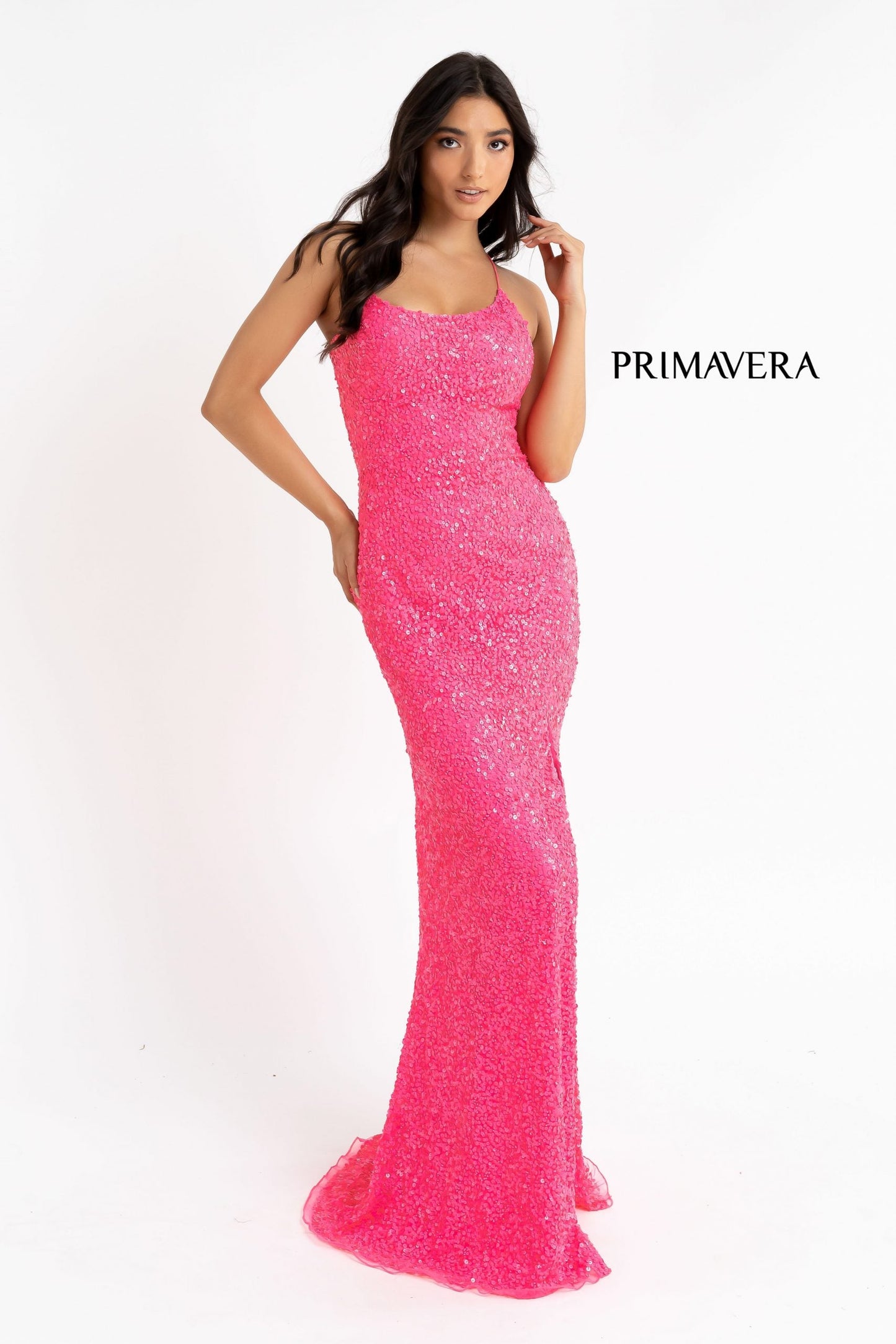 Primavera Couture 3290 This prom dress adds a pop to the multi sequins dress.  With a scoop neckline and spaghetti straps that cross and tie in the back.  This long evening dress has a side slit.  Available sizes:  000, 00, 0, 2, 4, 6, 8, 10, 12, 14, 16