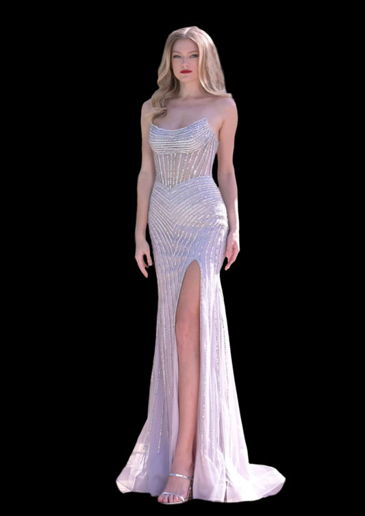 Be the star of the night with the Colors Dress 3568 Sheer Crystal Scoop Neck Prom Dress Pageant Gown Slit Formal Evening. This elegant gown features a stunning sheer crystal scoop neck, perfect for showing off your natural beauty. The slit adds a touch of glamour, making you stand out from the crowd. Make a statement and feel confident in this beautiful dress.