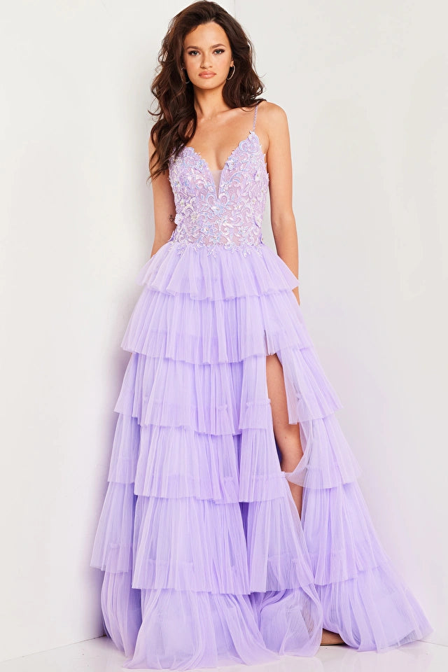 The Jovani 37190 is a part of their formal collection and is a truly exquisite prom dress. It is made from delicate tulle fabric and features an A-line silhouette. This floor-length gown has a pleated layered skirt with a daring thigh-high slit, which adds a touch of drama and allows for graceful movement.  The bodice of this dress is a showstopper, featuring intricate illusion embroidery embellished with stones and sequins. 