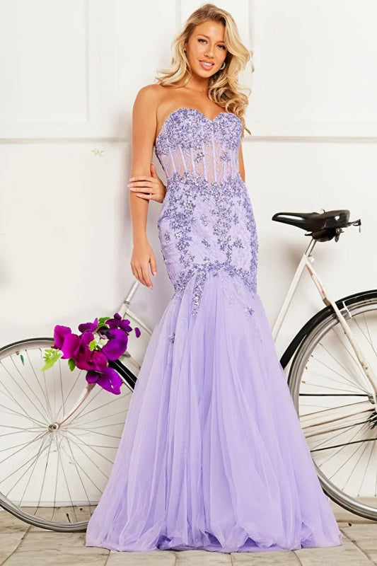 The Jovani 37249 is a dazzling formal gown that exudes glamour and sophistication. Part of the formal collection, this mermaid-style dress is crafted from delicate tulle material, adding an ethereal and romantic quality to the overall design.  The gown is adorned with sequin embellishments and intricate embroidery, creating a stunning play of light and texture. The flare bottom adds a touch of drama, ensuring a captivating and memorable entrance. 