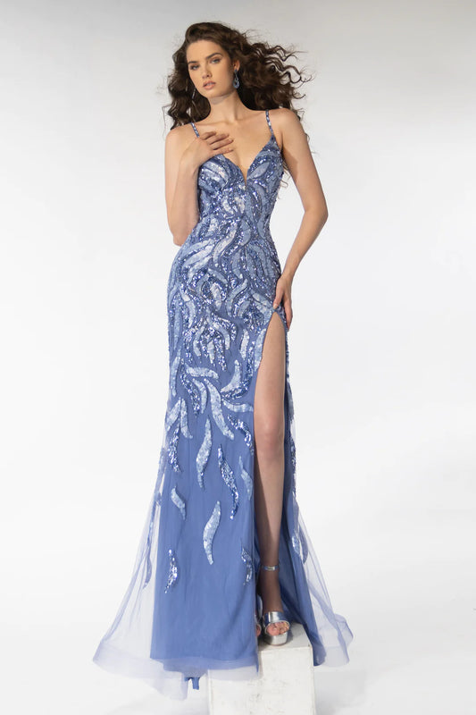 The Ava Presley 39220 Long Prom Dress is a stunning choice for your special occasion. Featuring a sleeveless fitted design with intricate sequin detailing, this dress will make you stand out. The sheer V neckline adds a touch of elegance, making it perfect for formal events like pageants.